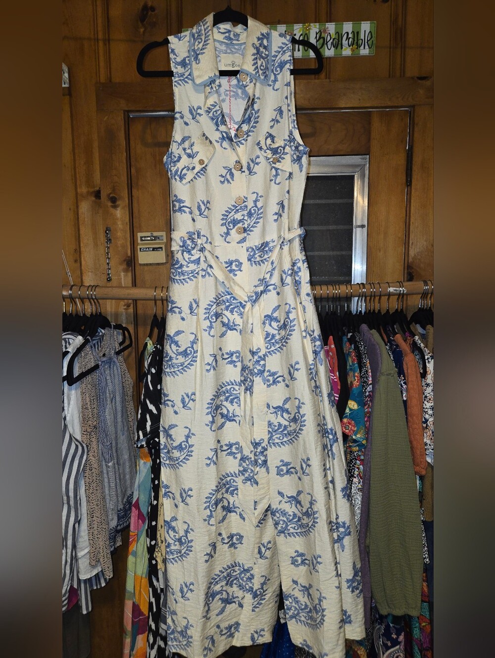 Umgee Cream Sleeveless Jumpsuit with Blue Floral Print